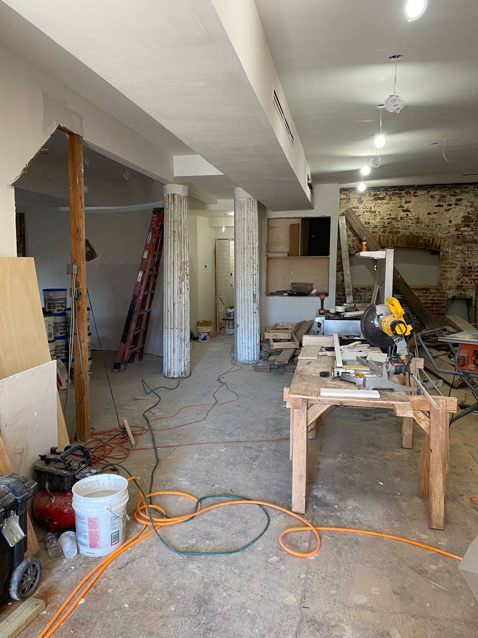 Skilled craftsman framing a basement wall