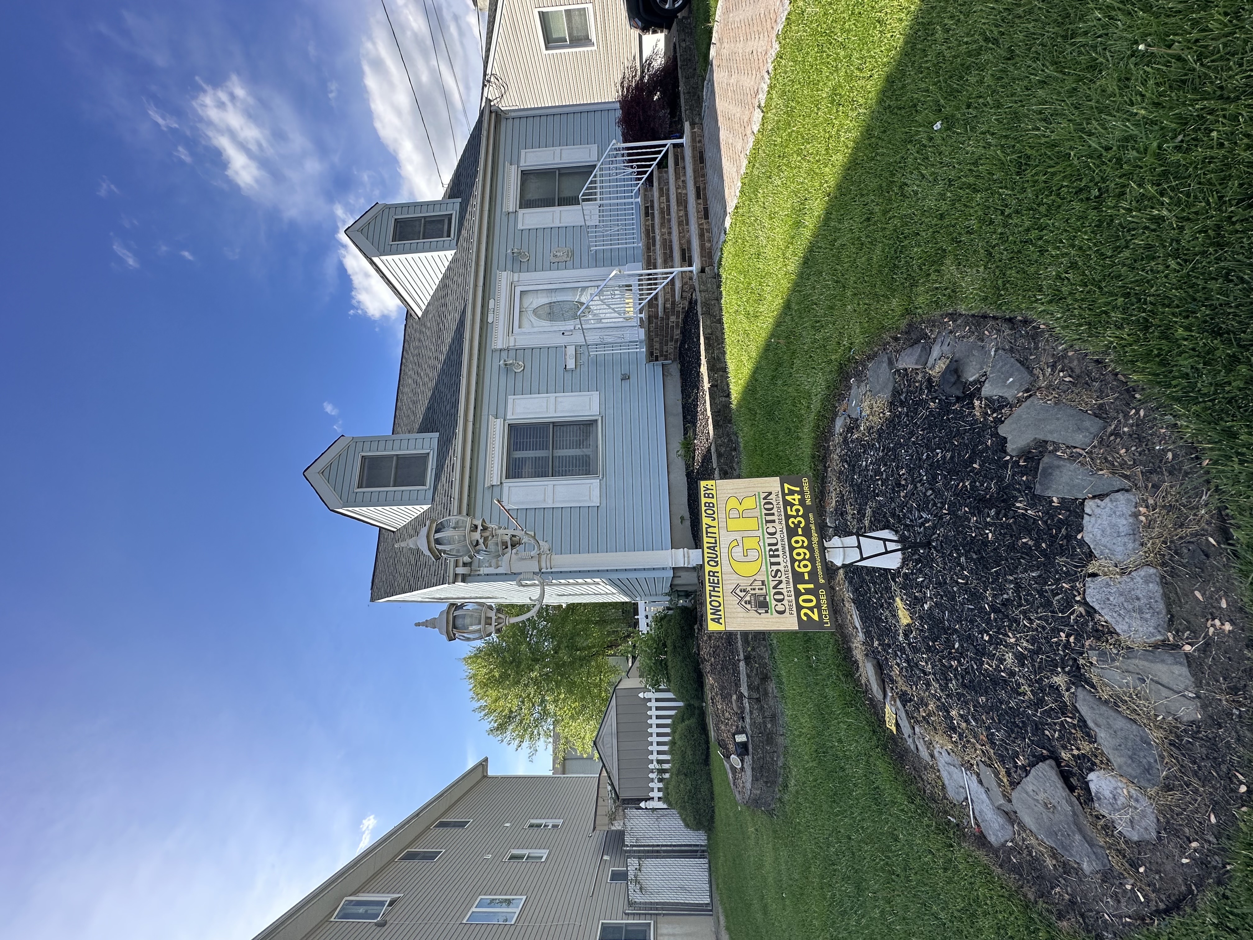 Beautiful home exterior with new siding and windows
